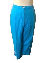 Bob Mackie Wearable Art turquoise pants with seahorse embroidered on right leg