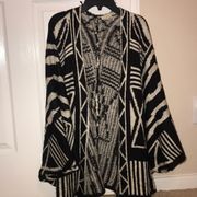 Cardigan with black and white details size S