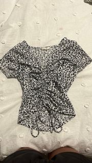 White and black cheetah cinch top