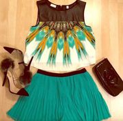 green pleated shorts