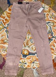 NWT Mid Rise Mauve Distressed Jeans
