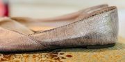 BCBG Paris Annya gold metallic flats in size 8.5M