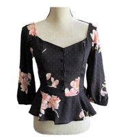 NWT- Beautiful black top with pink flowers, smocked back, 3/4 sleeves, ruffle bottom, brand new, size medium  Measurements: Bust: armpit to armpit 17-20 inches  Waist: side to side 14-16 inches  Length: shoulder seam to bottom 33 inches