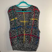 Vintage 80's Deep V Sweater Vest
Multi Color Pattern