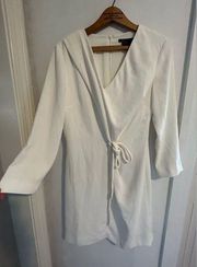 Armani Exchange size 8 dress with long sleeves and tie detail.