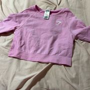 Pink Gymshark compression top with thumb holes- worn once