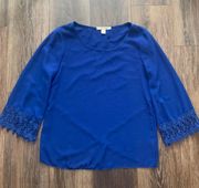 Blue flowy top with wide sleeves by , size small