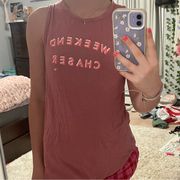 size women’s small, pink  tank, cut out back