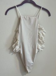 NWT Lolli swim laser cut ruffle cheeky white one piece swimsuit