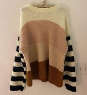 Truly madly deeply brand (urban outfitters) sweater stripped sleeves size M