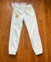 Altard State white smiley sweatpants 