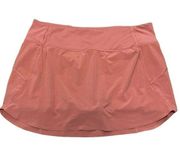 Athleta Pink Mid Rise Logo Stretch Athletic Zip Pocket Tennis Skort Women L