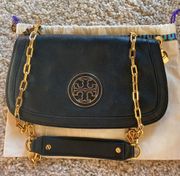 black leather purse with gold chain