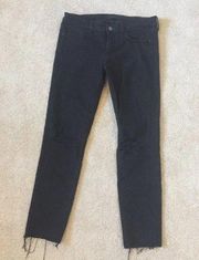 Uniqlo black distressed jeans in size 27.