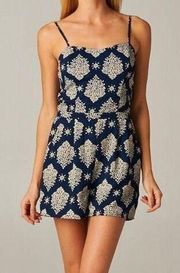 Navy and ivory print romper with pockets size medium