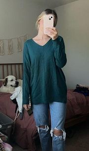 Emerald green exposed seam sweater