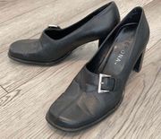 black genuine leather heeled loafers with buckle detailing