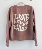 NG by Natalie Grant Love Never Fails Graphic Crewneck