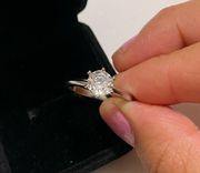 Round Cut Diamond Solitaire set in 925 Silver size 6