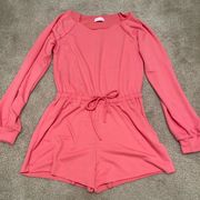 Off the shoulder. Coral/pink shorts long sleeve romper. NWOT. Size small.