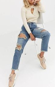 riot mom jeans with distressed rips in blue