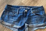 American Eagle  Low Rise Jean Shorts Size 6 Medium Wash Distressed Booty Shorts