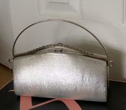 Nwot Silver Metallic Clutch With Plenty of Space And Pockets Inside And A Removable Silver Chain