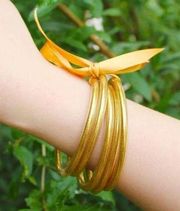 NWT Set Of Rope Tube Gold Bracelets