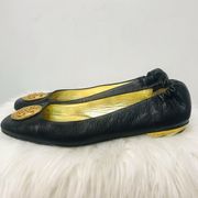 Juicy Couture black flats with gold symbol sz 9.5