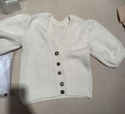 cream sweater with buttons