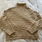 Crème striped sweater