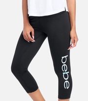 COPY - BEBE SPORT TIE DYE LOGO CAPRI size small womens leggings NWT