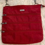 BAGGALLINI BAG excellent condition size 11” long 11” wide red color