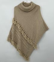 Steve Madden beige cable knit tassel fringe turtleneck poncho sweater