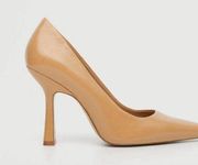 Pointed toe pumps

Medium Brown