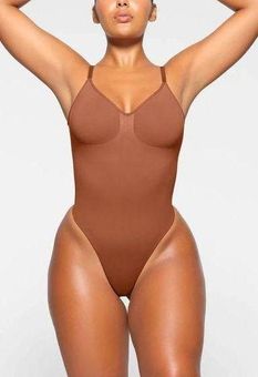 SKIMS Seamless Sculpt Low Back Thong Bodysuit Bronze Size S - $45 New With  Tags - From Kim