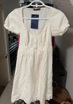 Brandy Melville Blair Babydoll Peplum Summer Dress White Size M - $20 (69%  Off Retail) New With Tags - From Kaitlyn