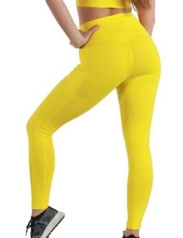 Ethos yellow neon highwaisted leggings w pockets - $15 - From Britney