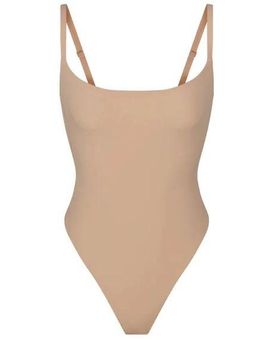 SKIMS NWT Clay Size M Fits Everybody Adaptive Thong Bodysuit Stretch Side  Close Size M - $31 New With Tags - From Cassandra