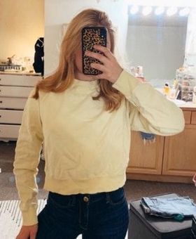 light yellow crew neck sweatshirt