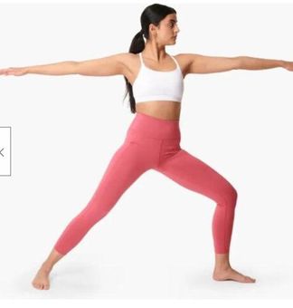 Sweaty Betty 7/8 super sculpt yoga leggings in pink.