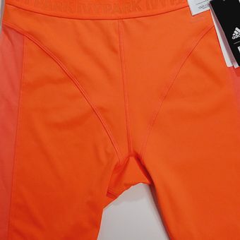 orange adidas cycling shorts