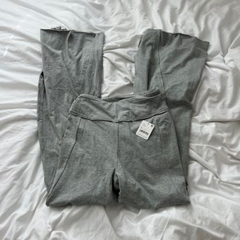 Free People flare leggings Size small Condition: NWT Color: heather grey  Details : - Flare at bottom with small slit - So cute - Fp movement - $60  New With Tags - From Alison