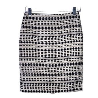 I purchased this Petite size 0 skirt from Ann Taylor. According to