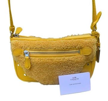 Buy COACH Women's Polished Pebble Crossbody Pouch LI/Yellow Crossbody Bag  at Amazon.in