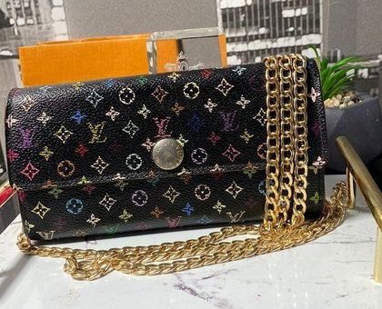 Authentic Louis Vuitton Mono Sarah Wallet