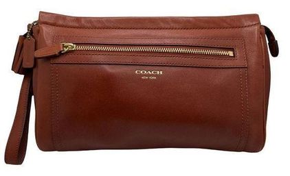 COACH Legacy Leather Large Clutch in Brown