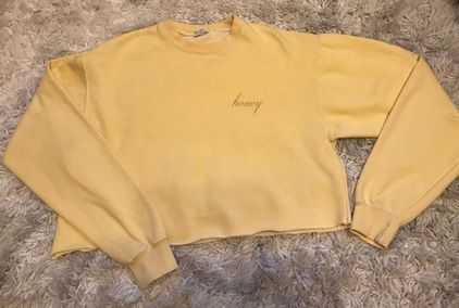 light yellow crew neck sweatshirt