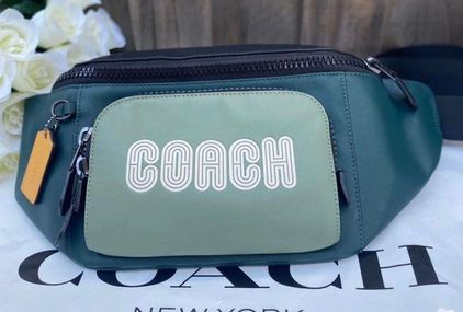 Buy the Coach Track Pack Blue Green Colorblock Crossbody Bag