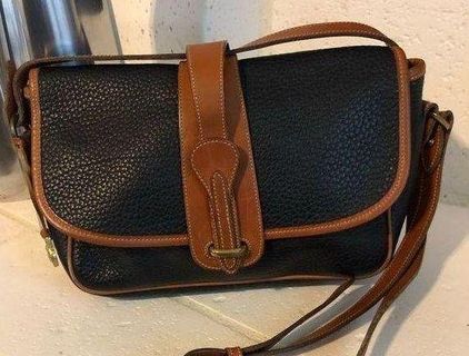 Is this Peanut Colored bag a genuine Dooney & Bourke?